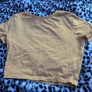 Soils yellow cropped tee